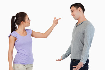 Young female blaming her boyfriend