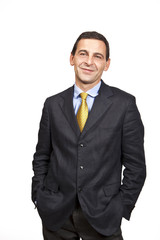 Portrait of confident businessman over white background