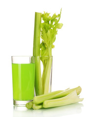 fresh green celery in a glass and juice isolated on white