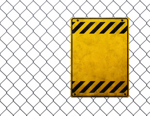 Empty yellow warning sign at chainlink fence