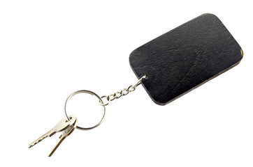 wooden tag with key isolated on white background