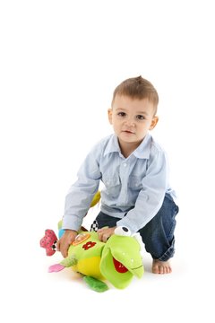 Sweet toddler with soft toy