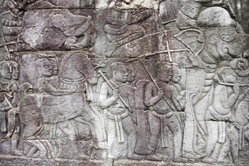 bassorilievo con scene di guerra ad angkor - obrazy, fototapety, plakaty