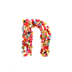 Candy letter on white background