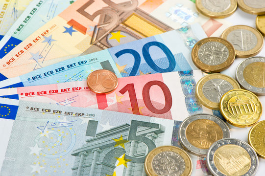 close up of euro currency. coins and banknotes