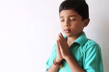 Indian CuteLittle Boy Praying © SBM Creatives
