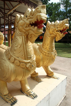 Big golden dragons in buddhist temple