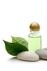 Stones and bottle on the white background