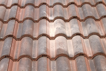Close-up of tiles on a roof renovation
