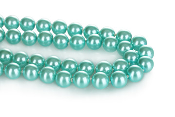 beautiful blue pearl beads isolated on white