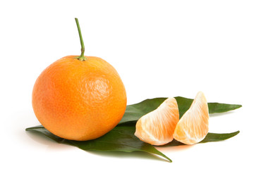 Fresh tangerine with leaves and segments