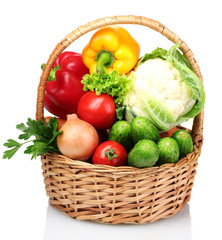 Fresh vegetables in basket isolated on white