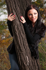 woman standing near a tree