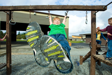 Young boy playing at a park