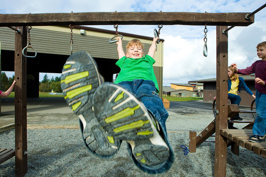 Young boy playing at a park