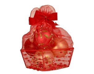 Gift basket with Christmas ornaments wrapped in a red organza