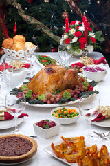 Fototapeta na wymiar Roasted Turkey and Christmas Tree