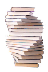 Spiral stack of books isolated on white