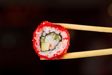 Sushi with chopsticks