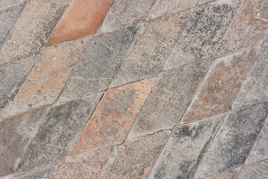 Very old paved church floor background