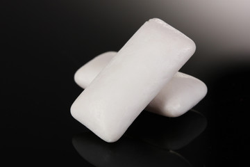 Chewing gums on black background