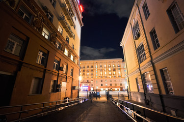 Fototapeta premium night view from the court into the lighted street