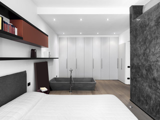 Camera da letto moderna con vasca da bagno © adpePhoto