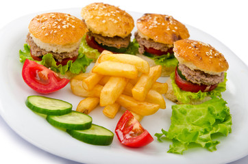 Plate with burgers and french fries