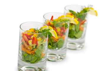 Tasty salad served in glasses