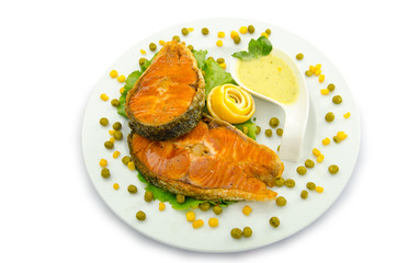 Salmon roasted and served in the plate