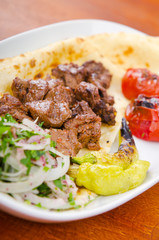 Kebab served in the plate