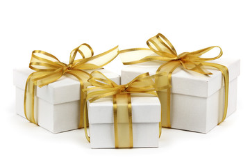 Gift boxes with golden ribbon