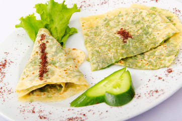 Pancakes stuffed with various herbs