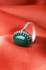 Fashion concept with ring on background