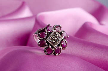 Fashion concept with ring on background