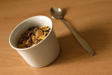 Healthy cereals in a bowl with a spoon