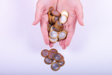 coins in the hands of