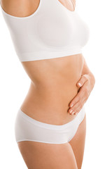 Woman touching her stomach