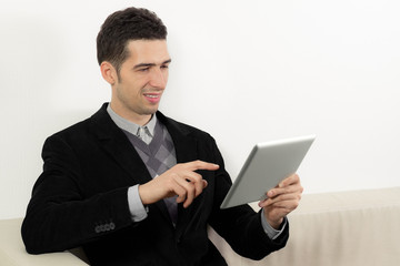 Businessman Using A Touch Screen Tablet