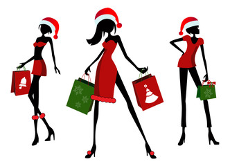 Fototapeta na wymiar Christmas shopping. 3 different girls with shopping bags