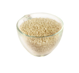 Glass cup with rice groats