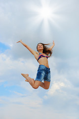 Beautiful Woman over blue Sky