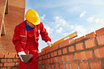 construction mason worker bricklayer - obrazy, fototapety, plakaty