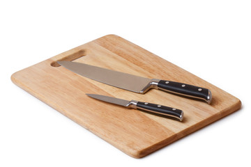 table knife and wooden cutting board