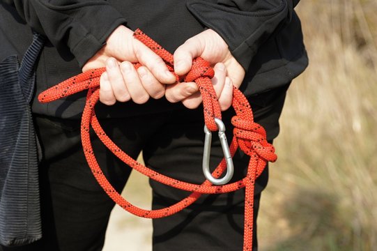 Leash with snap-hook behind back
