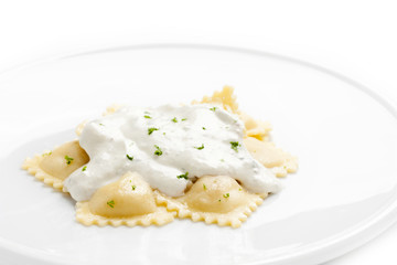 Ravioli with cheese sauce