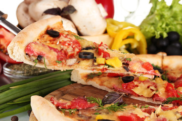 delicious pizza and vegetables closeup