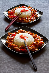 Chinese dish with szechuan chicken and rice