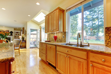Kitchen in golden maple wood
