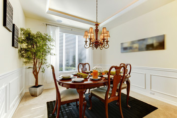 Elegant dining room with decorated table for fall dinner